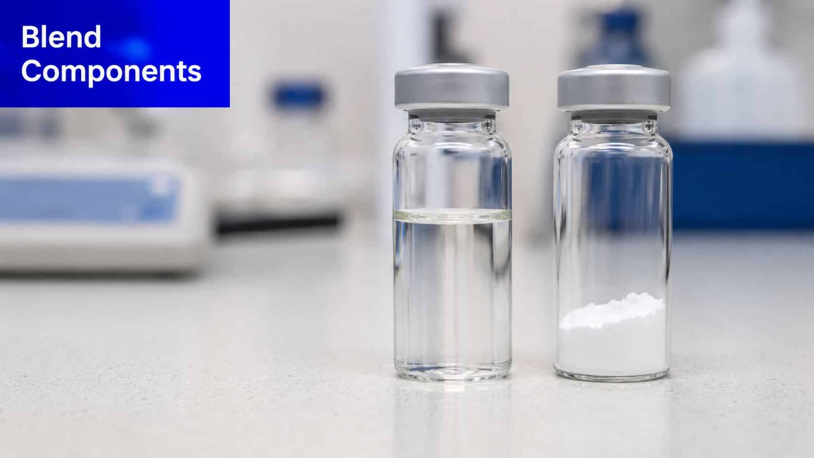Two glass vials on a laboratory counter, one containing clear liquid and the other white powder.